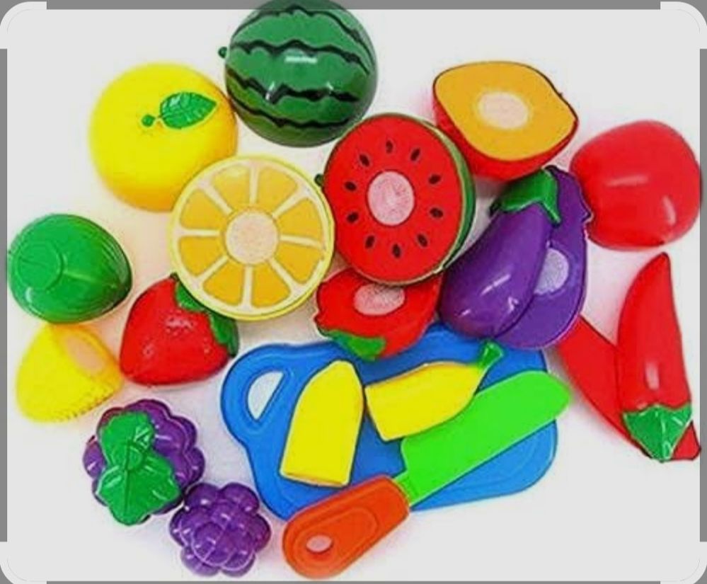Plastic toys in the shape of fruits and vegetables